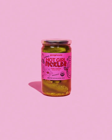 Jar of 'Hot Girl Pickles' on a pink background