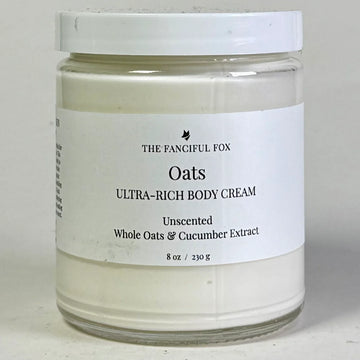 Jar of 'Oats Ultra-Rich Body Cream' by The Fangiful Fox on a light background