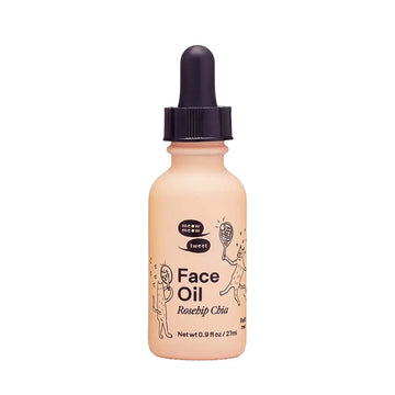 Bottle of face oil with a dropper on a white background