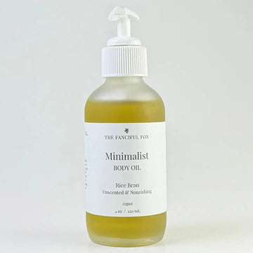 Bottle of 'Minimalist Body Oil' by The Fanciful Fox on a white background