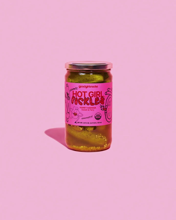 Jar of 'Hot Girl Pickles' on a pink background