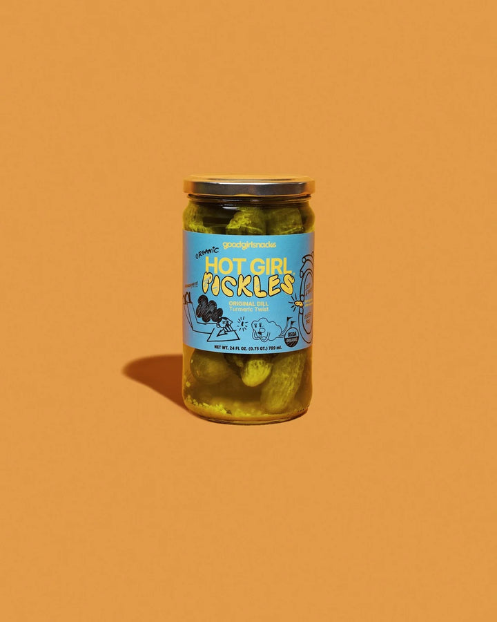 Jar of 'Hot Girl Pickles' on an orange background