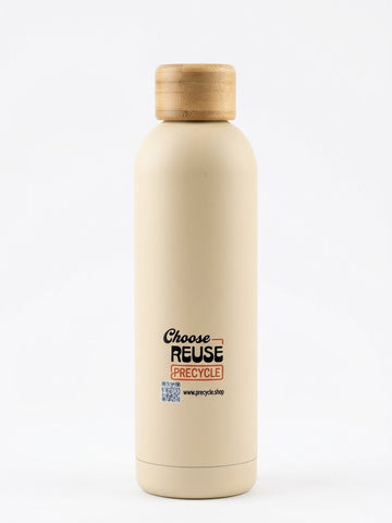 A matte cream-colored reusable water bottle with a light natural wood cap, featuring a 'Choose REUSE PRECYCLE' label on the front, set against a plain white background.