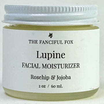 Facial moisturizer jar labeled 'Lupine' by 'The Fanciful Fox' on a white background