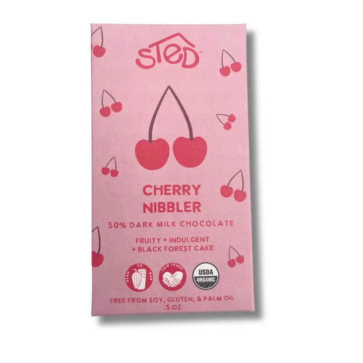 Pink chocolate bar packaging with cherry design and 'STED' branding on a white background