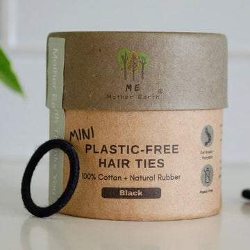 Kraft paper container with 'Mother Earth' branding for plastic-free hair ties on a white background.