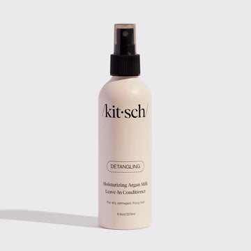 Kit-sch detangling leave-in conditioner bottle on a light gray background