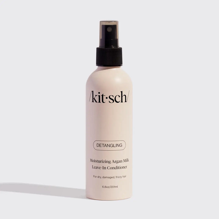 Kit-sch detangling leave-in conditioner bottle on a light gray background