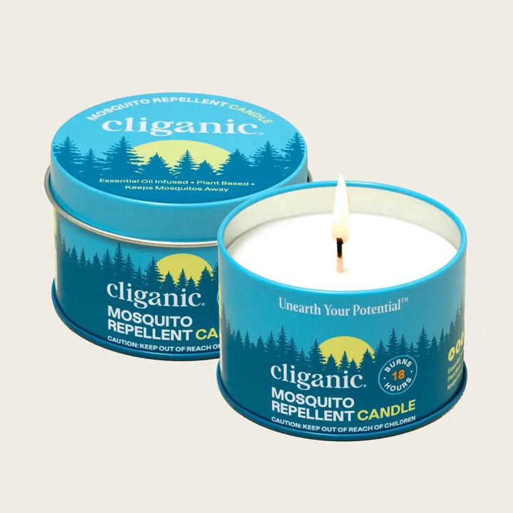 Two Cliganic Mosquito Repellent Candles in blue metal tins, one unlit and one lit with a visible flame, on a light beige background.