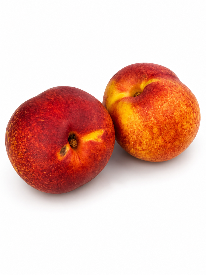 Two ripe nectarines with red and yellow-orange skin, photographed on a clean white background.