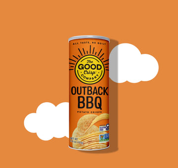 Can of The Good Crisp Company Outback BBQ potato crisps on an orange background