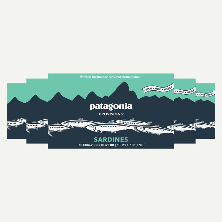 Patagonia Provisions sardine can packaging with mountain and fish illustrations on a light gray background.