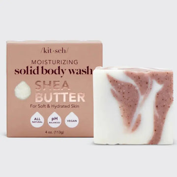 Shea butter moisturizing solid body wash with packaging on a light gray background